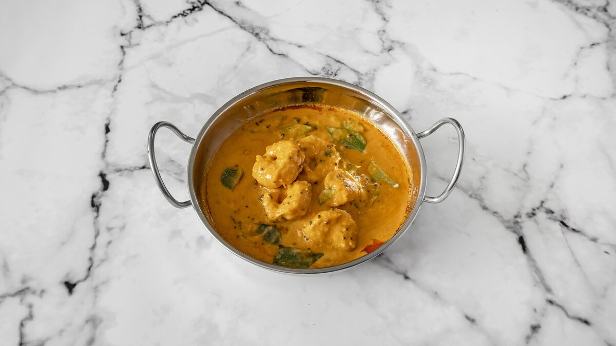 Coconut prawn curry in a steel karahi, coastal Indian home cooking by Chef Sakshi Ahluwalia