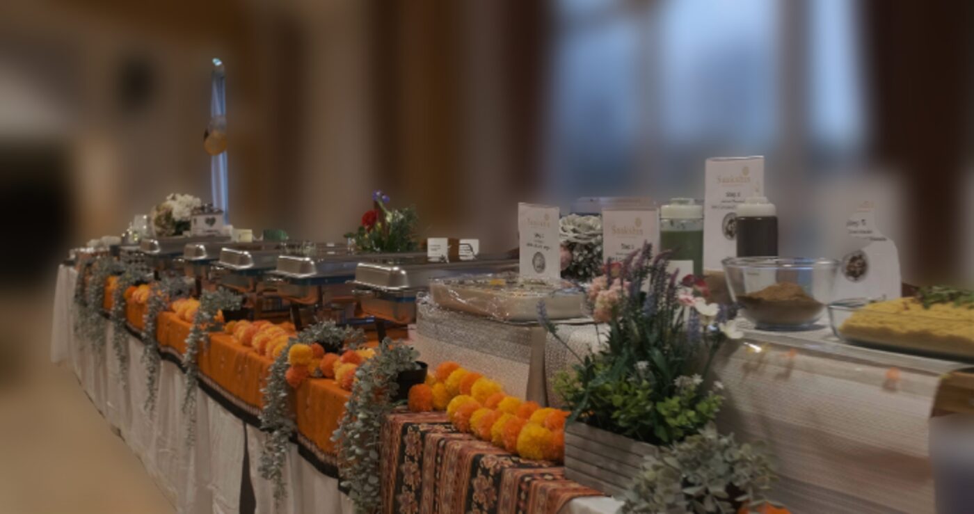 Indian wedding and event catering buffet with marigold styling by Saakshi's Kitchen